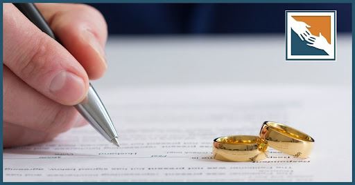 Wedding rings on divorce papers