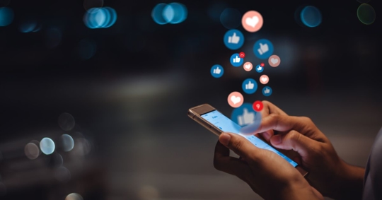 Woman posting on social media